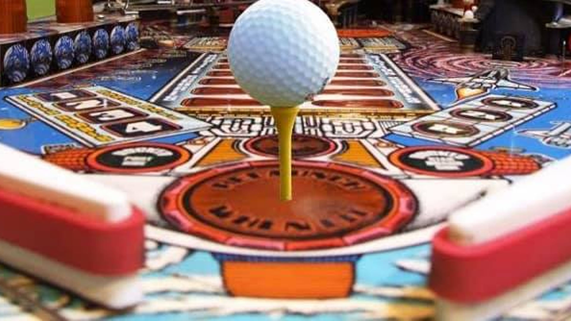 golf ball on a pinball playfield