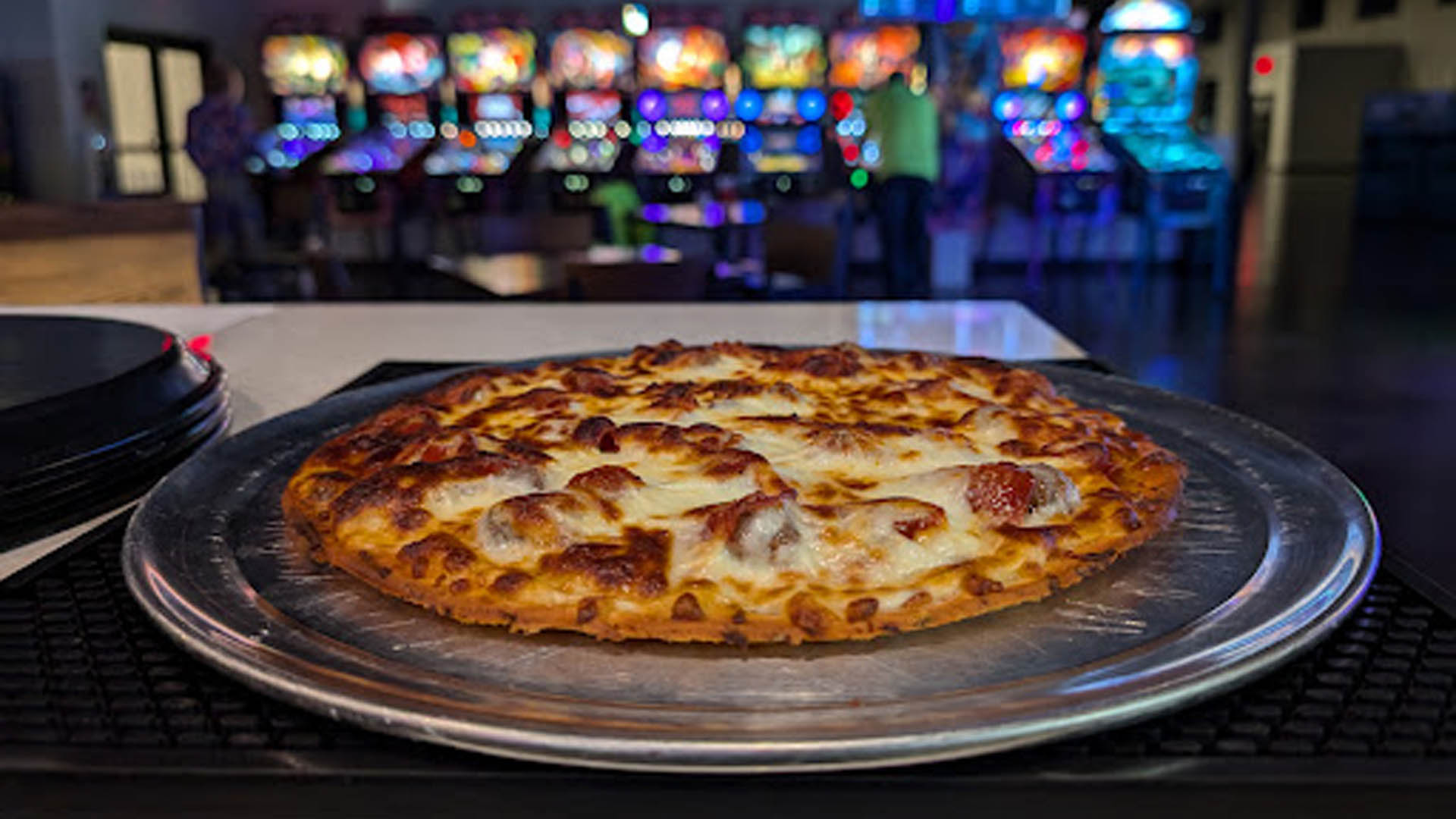Pizza on the bar at the Kickback
