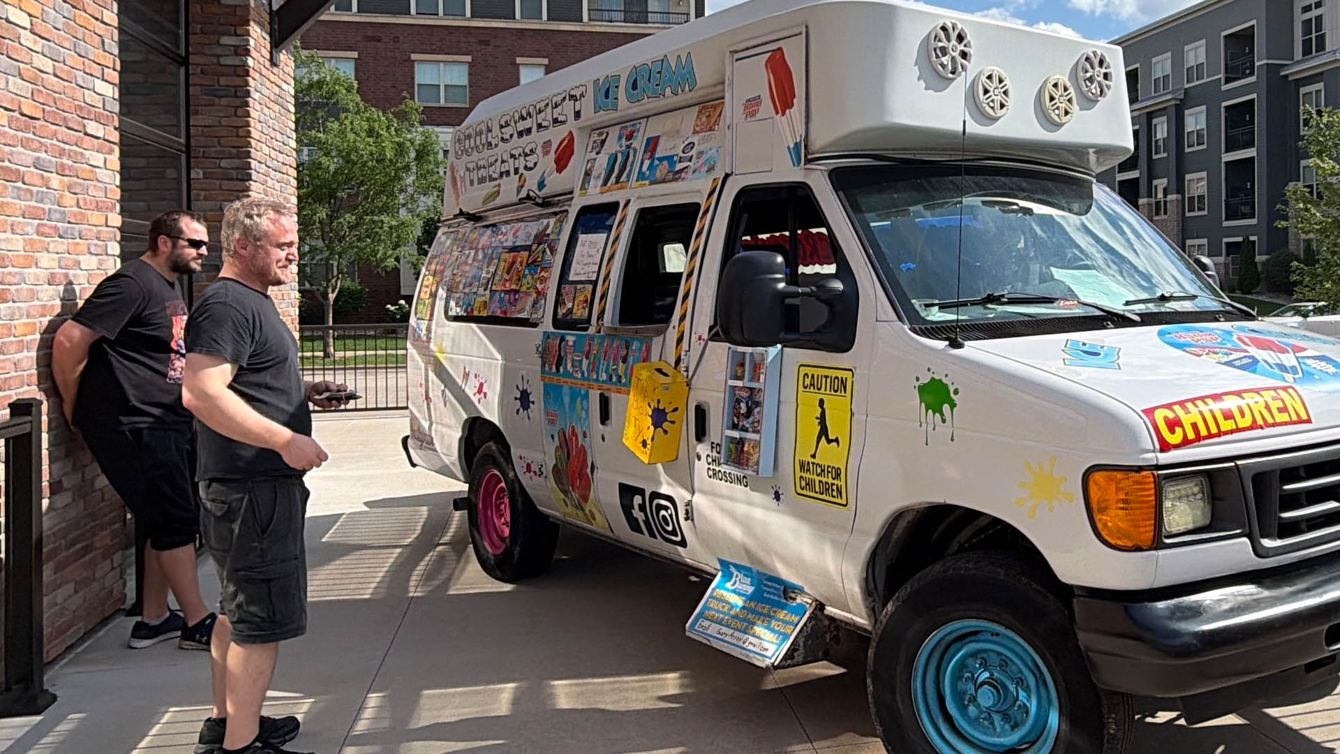 The Kickback Staff happily waiting in front of the ice cream truck
