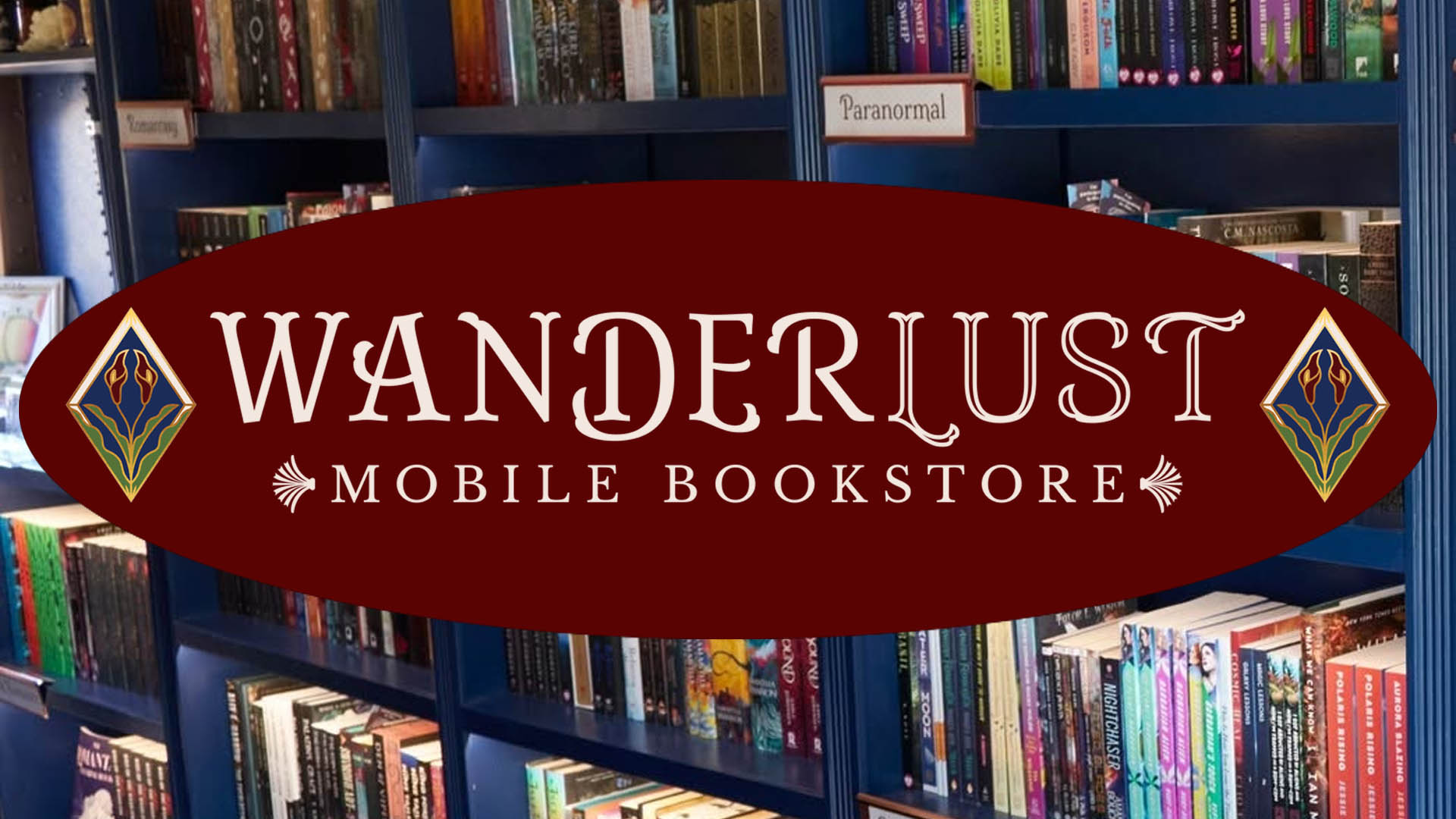 WanderLust Mobile Bookstore logo in front of shelves of books